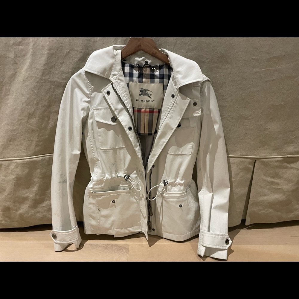 Burberry hooded raincoat, lined in Burberry signature checks.
